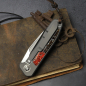 Preview: 25/077 German Edition Fuller iMamba brown/orange Arno Bernard Knives Kudu Bone + Titanium RWL-34 - Framelock