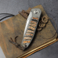 Preview: 25/097 - German Edition Fuller - Arno Bernard Knives iMamba Damascus steel mammoth molar titanium