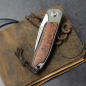 Preview: 25/074 - German Edition - iMamba Arno Bernard Knives Ironwood knife + titanium handle RWL-34 - Framelock