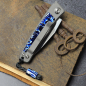 Preview: 25/035 - Arno Bernard Knives - Slipjoint Titanium Pocketknife RWL34 with scales Kudu bone blue