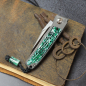 Preview: 25/040 Rinkhals - Arno Bernard Knives - Slipjoint Titan Taschenmesser RWL34 mit Beschalung Kudu Knochen grün