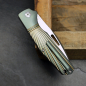 Preview: J.E. Made Knives Combustion CPM-S35Vn Ray Milling Double Colored green Titan