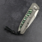 Preview: 24-187 German Edition fuller - Arno Bernard Knives iMamba RWL-34 mammoth molar green titanium