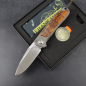 Preview: German Edition - iMamba Arno Bernard Knives Ironwood knife + titanium handle RWL-34 - Framelock 24-666