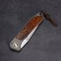 Preview: German Edition Fuller - iMamba Arno Bernard Knives Ironwood + titanium handle RWL-34 - Framelock knife