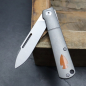 Preview: JE made Barlow 2022 Smooth Titan M390 steel slipjoint pocket knife with shield made of paper micarta in orange