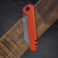 Preview: Kansept bulldozer low budget with D2 steel TiCn coated and scales made of G10 in orange liner lock