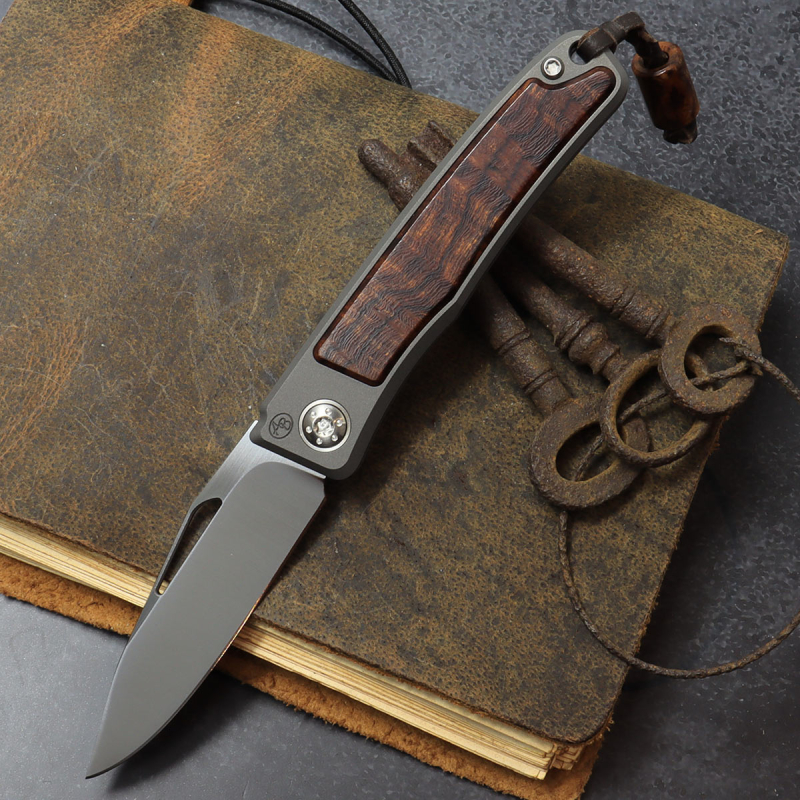 25/023 - Arno Bernard Knives Rinkhals skelettiert Titan Taschenmesser Ironwood RWL34 Half stop