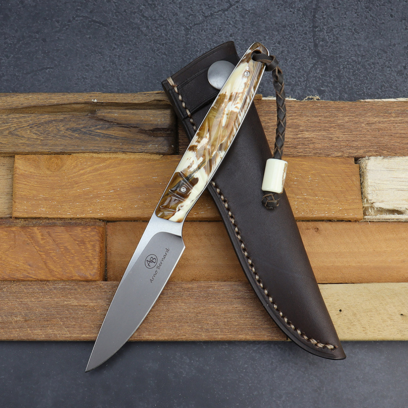 Bateleur elegant leisure knife with handle made of colored warthog tusk - Arno Bernard Knives