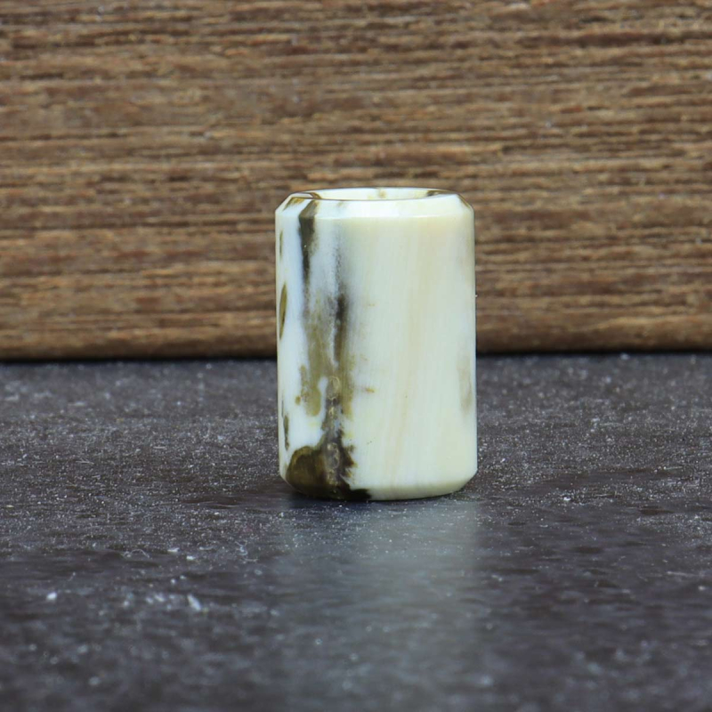 Bead made from dyed warthog tusk - Arno Bernard Knives