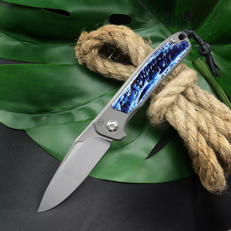 German Edition - Arno Bernard Knives iMamba Kudu bone blue + titanium handle RWL-34 - Framelock