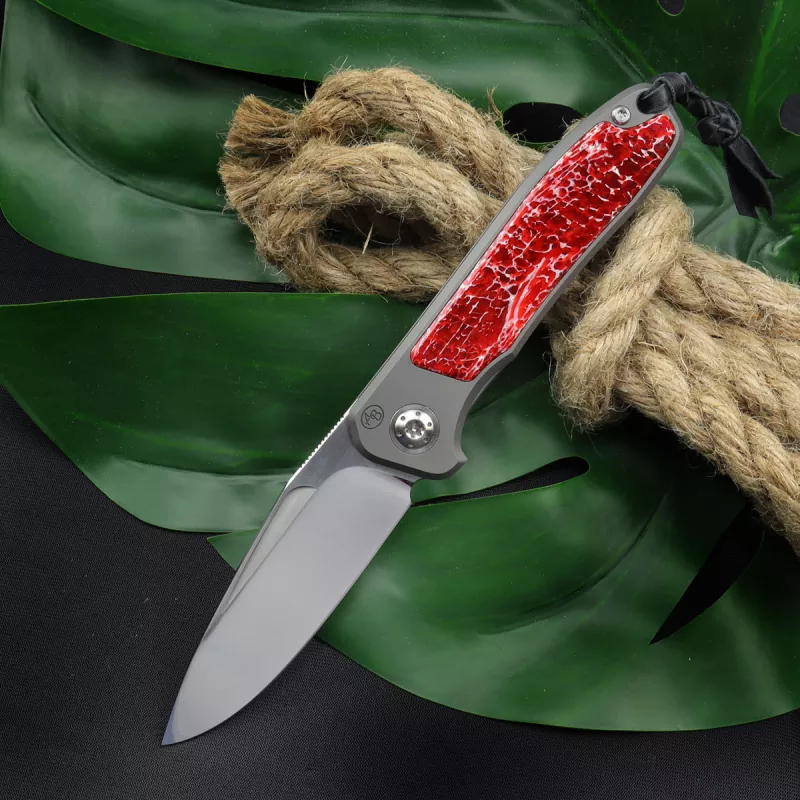 German Edition - Arno Bernard Knives iMamba Kudu bone red + titanium handle RWL-34 - Framelock