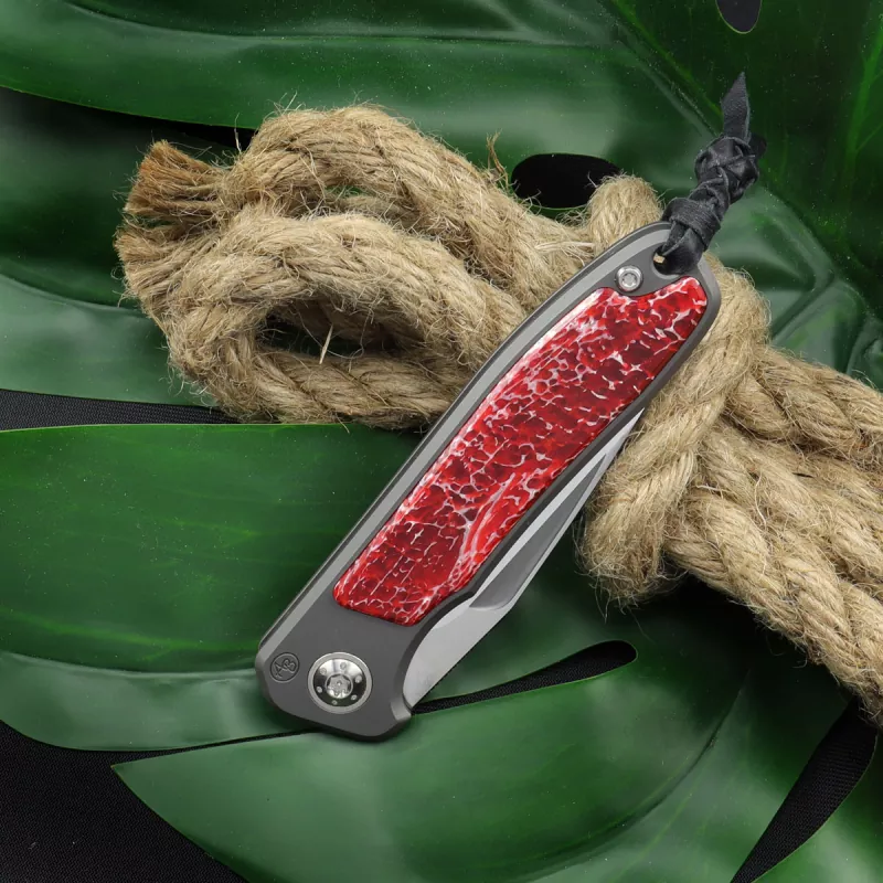 German Edition - Arno Bernard Knives iMamba Kudu bone red + titanium handle RWL-34 - Framelock
