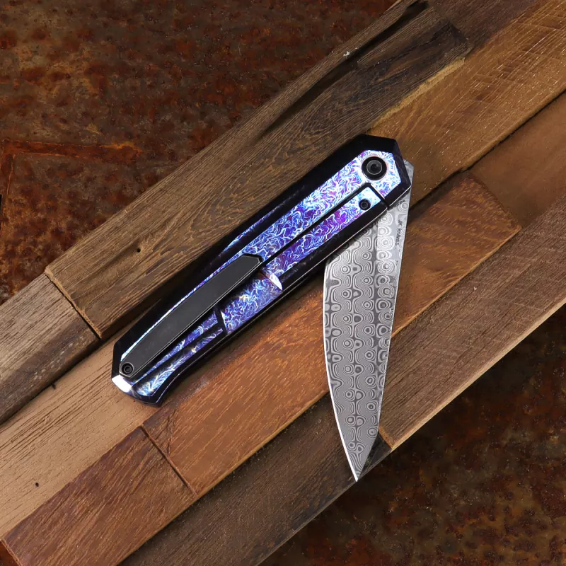 Kansept Integra Damascus blade with anodized titanium handle in Lightning Strike designed by JK Knives