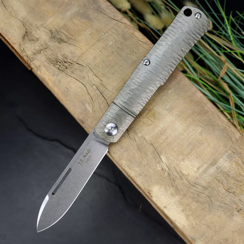 J.E. Made Knives Gunstock Stonewashed Blade CPM-S35Vn Handle made of titanium grooved by hand