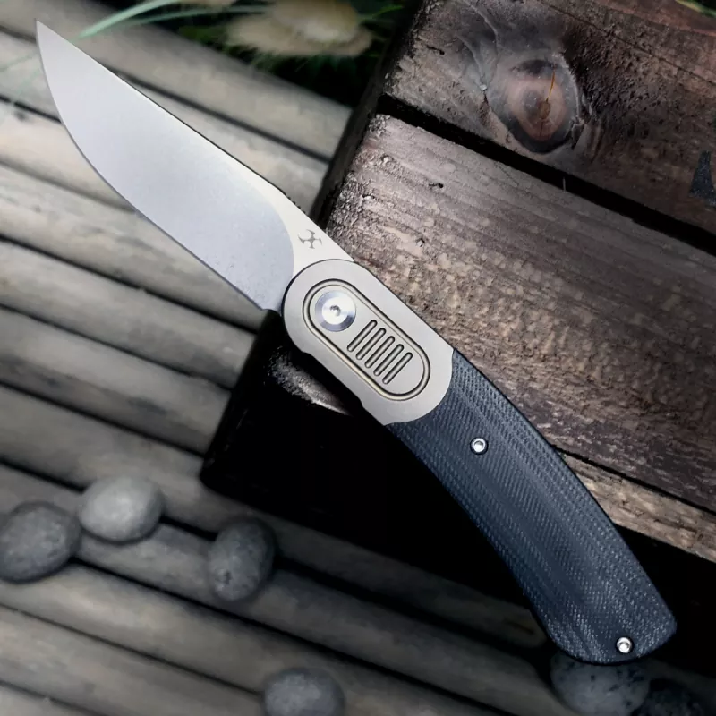 Kansept Knives Reverie - CPM-​S35VN Frontflipper mit Titan anodisiert und G10 Design von Justin Lundquist - Kaufempfehlung