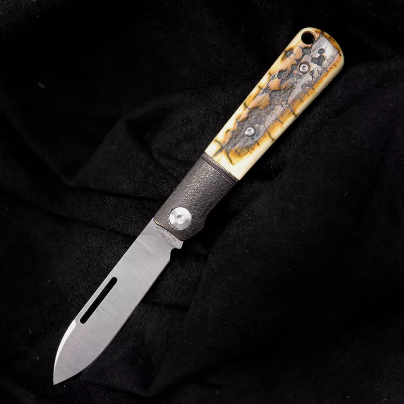 JE made Barlow 2022 slipjoint knife with mammoth tusk M390 hand jigged bronze bolster