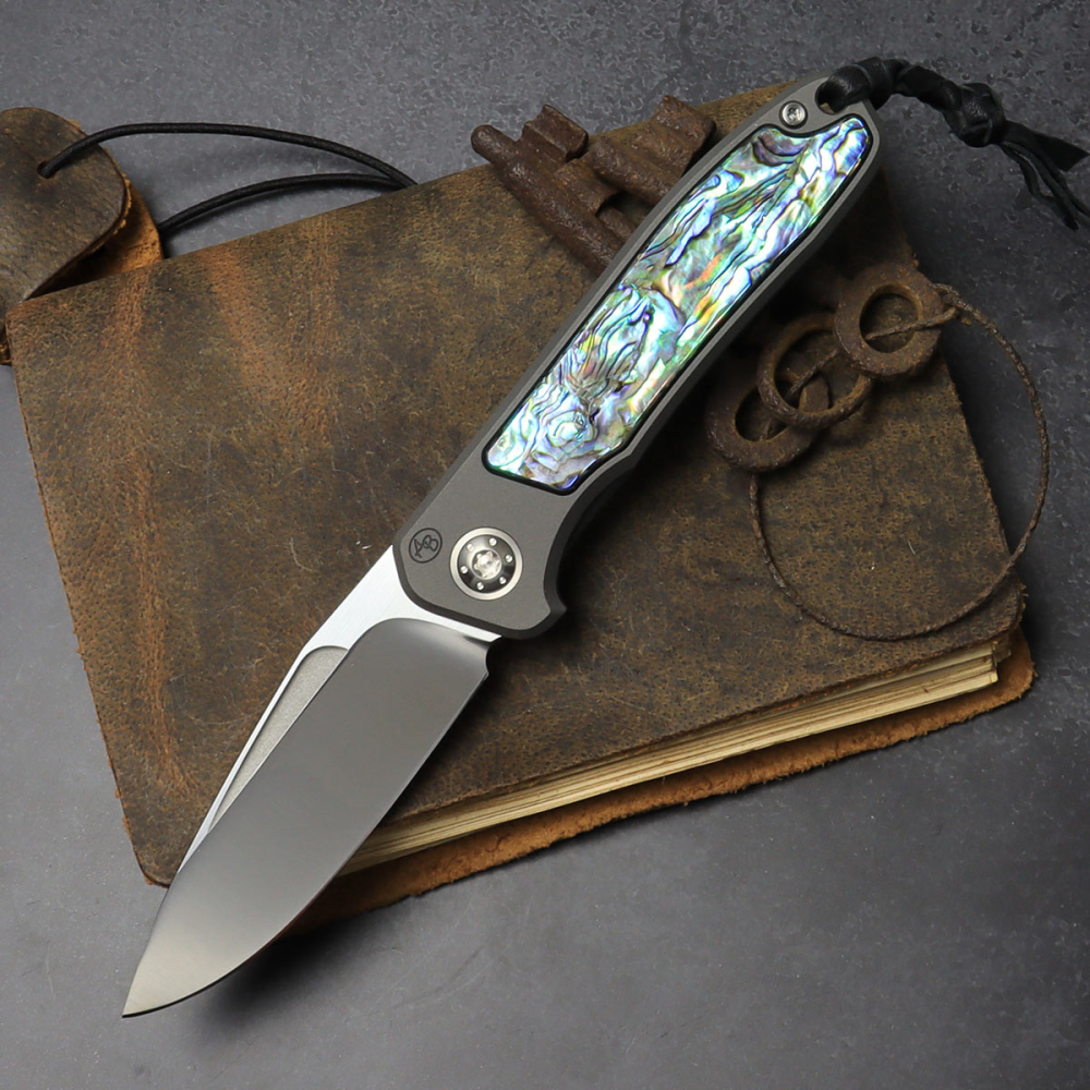25/083 German Edition Fuller - Arno Bernard Knives - iMamba titanium knife / folder for the first time with an abalone blade made of RWL-34 steel