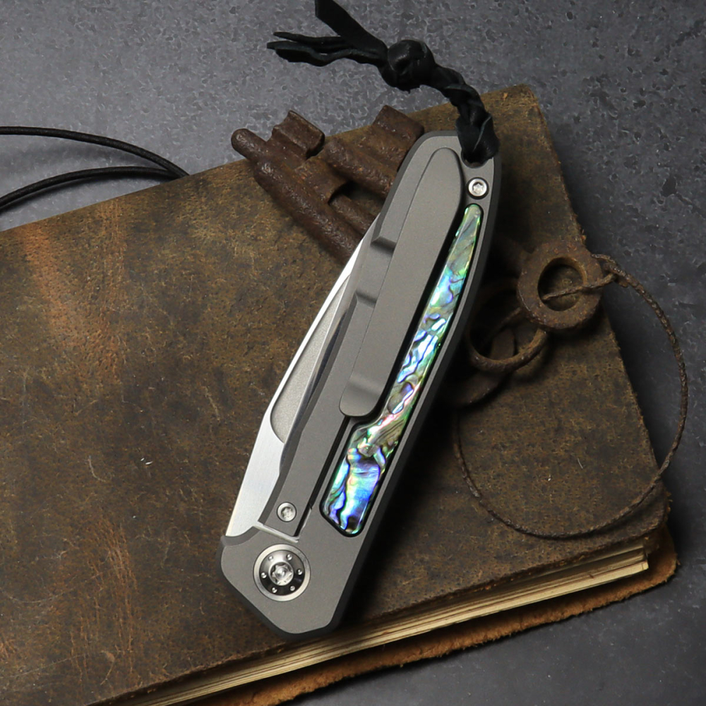 25/083 German Edition Fuller - Arno Bernard Knives - iMamba titanium knife / folder for the first time with an abalone blade made of RWL-34 steel
