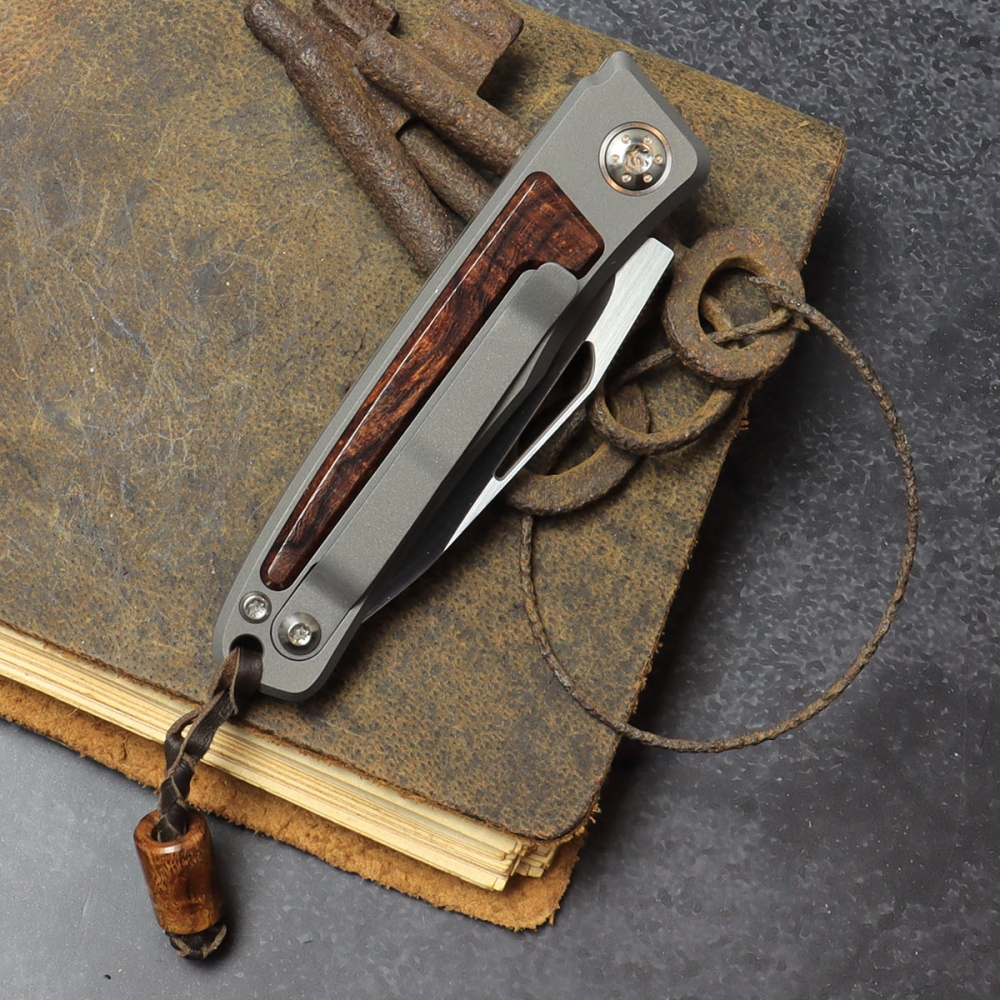 25/023 - Arno Bernard Knives Rinkhals skelettiert Titan Taschenmesser Ironwood RWL34 Half stop