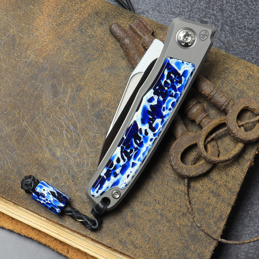 25/035 - Arno Bernard Knives - Slipjoint Titanium Pocketknife RWL34 with scales Kudu bone blue