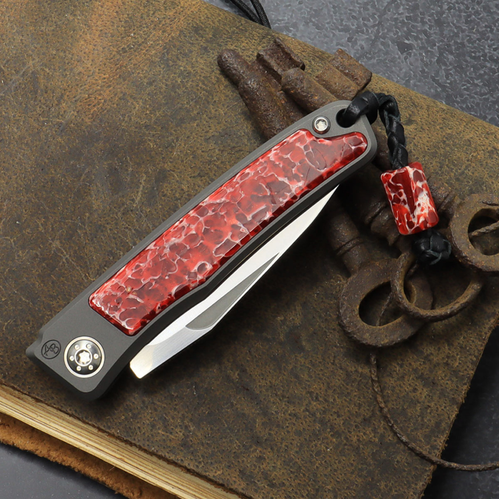 25-029 Rinkhals - Arno Bernard Knives - Titanium Pocketknife RWL34 with scales Kudu bone red