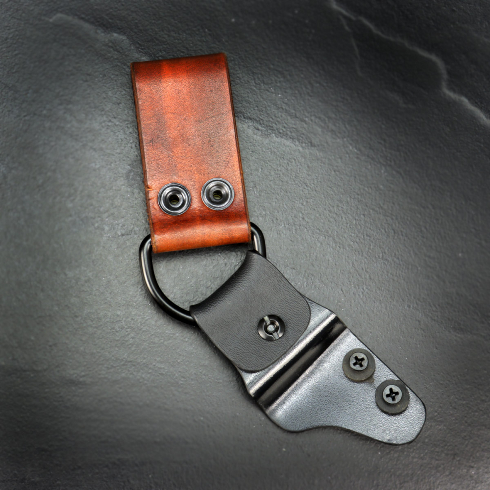 Kydex belt adapter / dangler with leather straps brown and press studs laterally movable