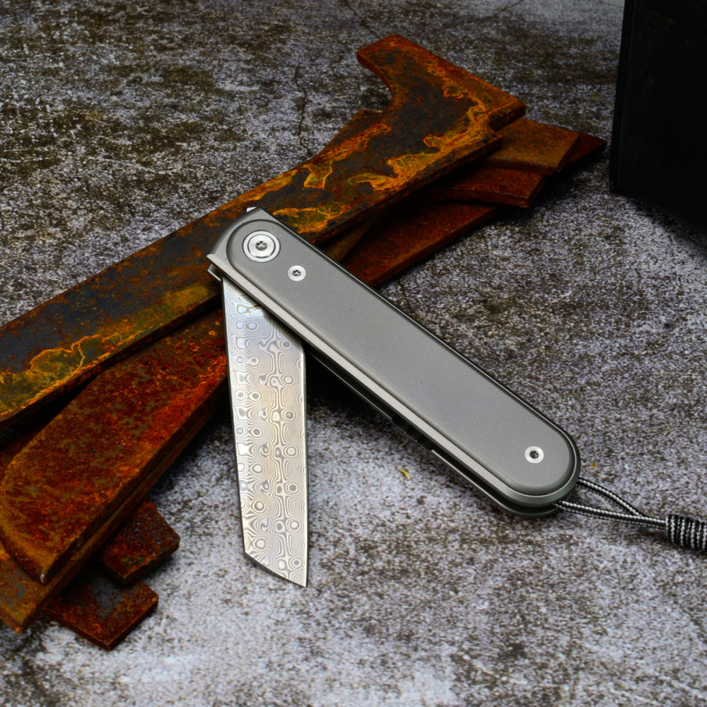 James Brand - Duval Damasteel mit Titan Griff Frontflipper Damast Taschenmesser