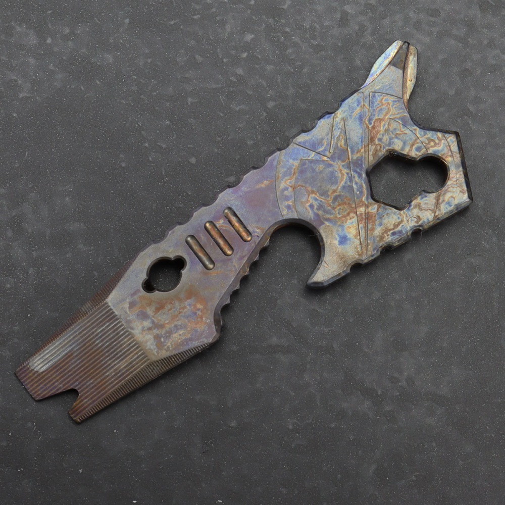 X1 Custom - A tool for the Prybar keychain made of heat anodized titanium